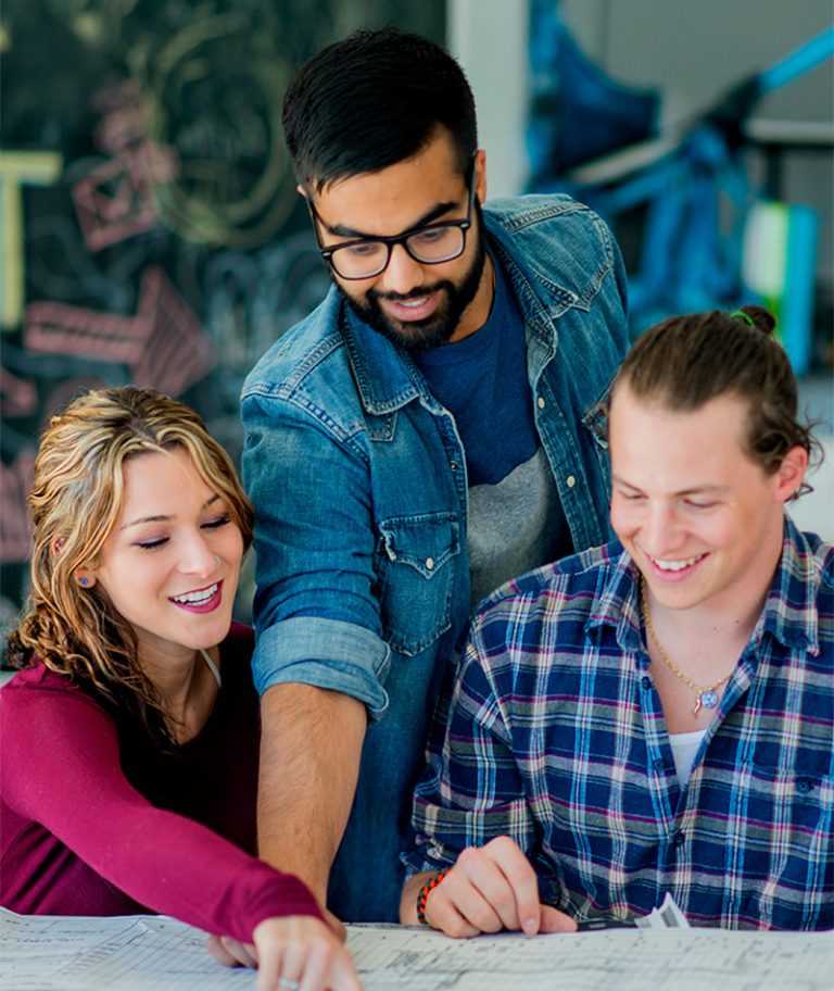 students-doing-work-they-love-img Students working on a group project and doing work aligned with what motivates them
