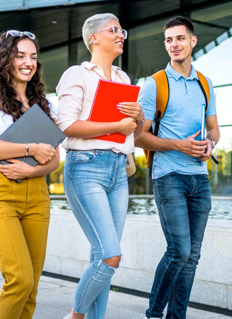 First-year college students walking across campus together